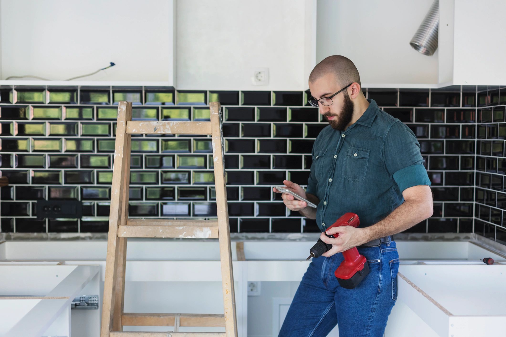 Homeowner reviewing appliance instructions on a phone