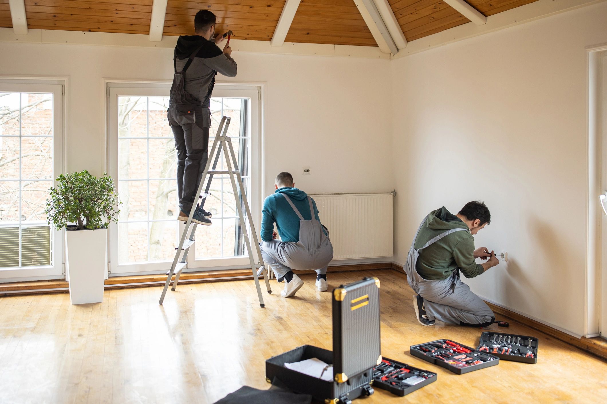 Renovation team working professionally inside a home