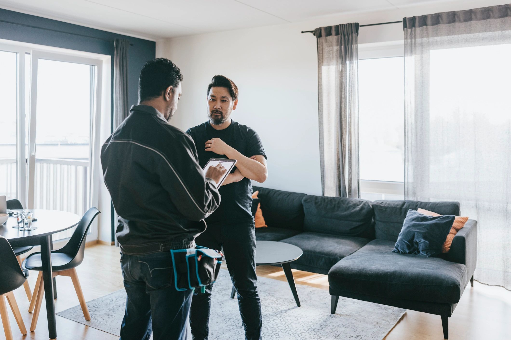 Contractor discussing renovation plans with a homeowner