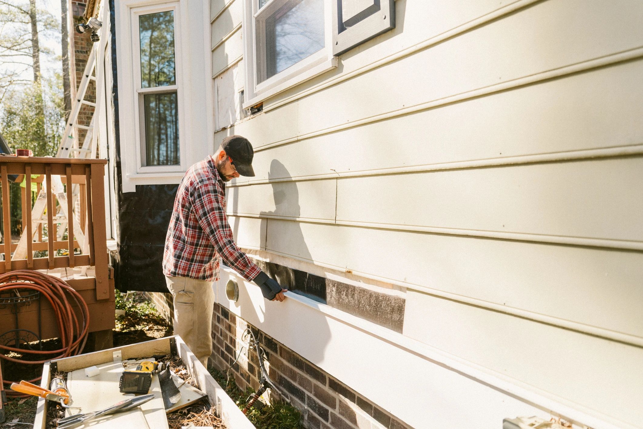 Technician performing home plumbing repair